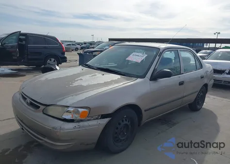 2000 Toyota Corolla Ce из США, поврежденный, VIN 1NXBR12EXYZ337319